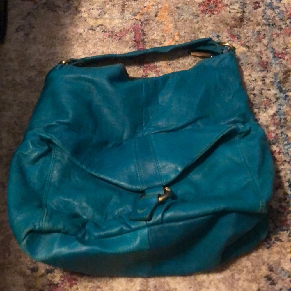 Perkins purse in turquoise.